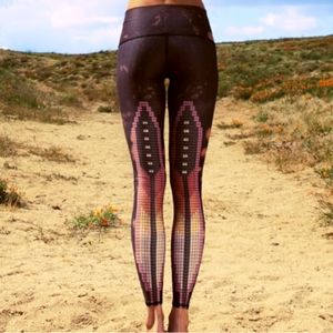 Teeki sacred feather leggings size small.